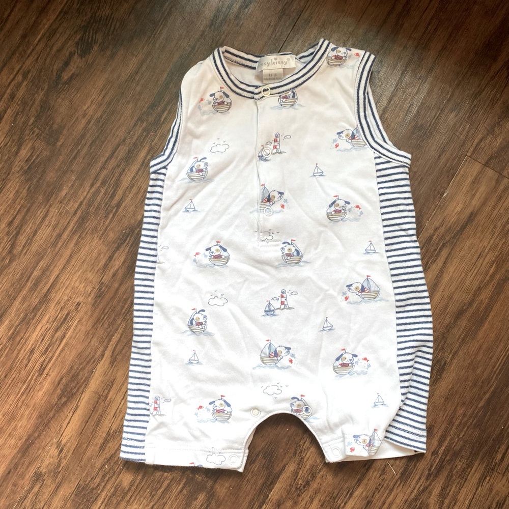 Kissy Kissy playful dog in a sailboat size 0-3 months! ⭐️